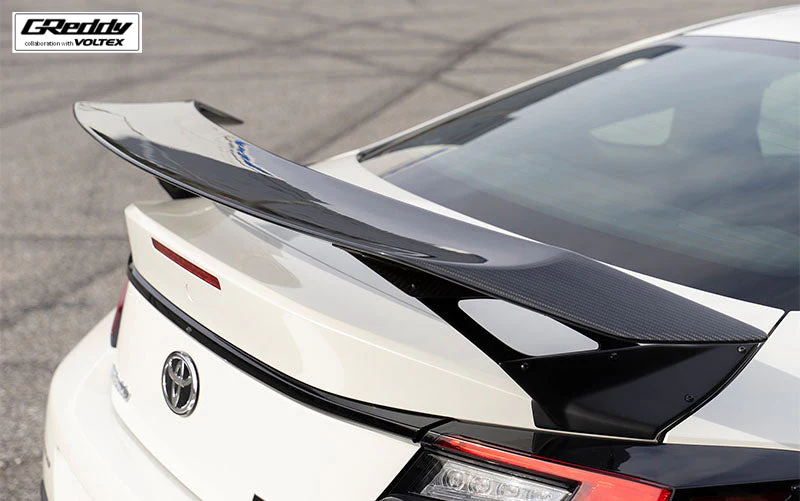 GReddy VOLTEX Rear Wing Side Mounts Wet Carbon - 2022-2024 Toyota GR86 - Image 2